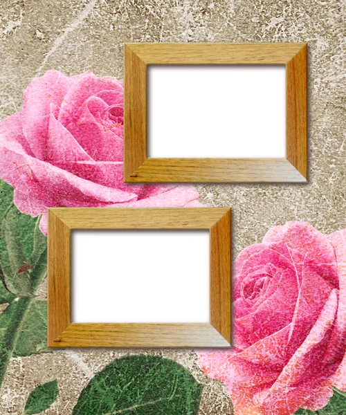 Roze rozen en houten fotolijstjes — Stockfoto