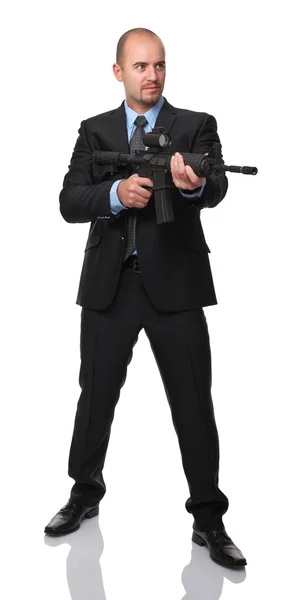 Homem de negócios com rifle — Fotografia de Stock