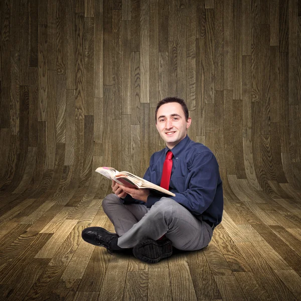 Man on wood floor — Stock Photo, Image