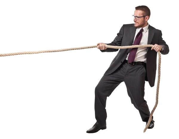 Homem puxar corda — Fotografia de Stock
