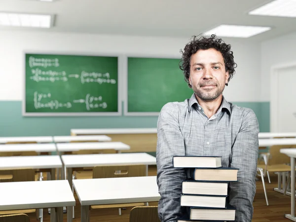 Estudante com livros em sala de aula — Fotografia de Stock