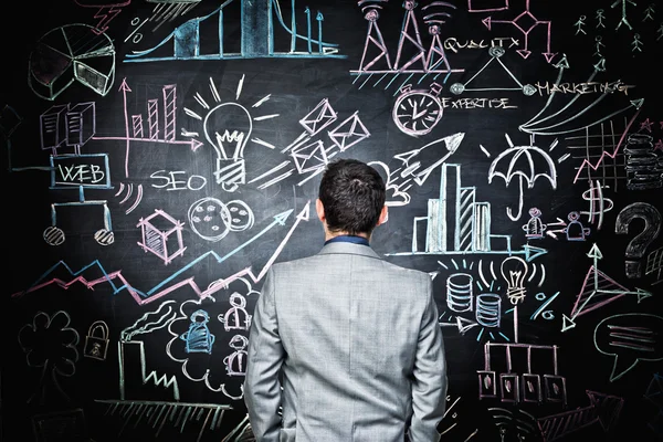 Business blackboard and man — Stock Photo, Image