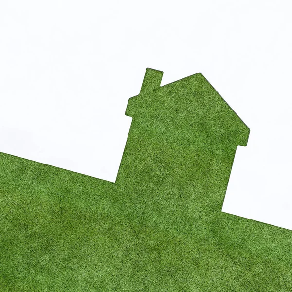 草の質感と白の部分で家のシルエット 3Dレンダリング エコハウスコンセプト — ストック写真