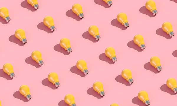 yellow light bulbs on pink background in flat lay style. 3d render