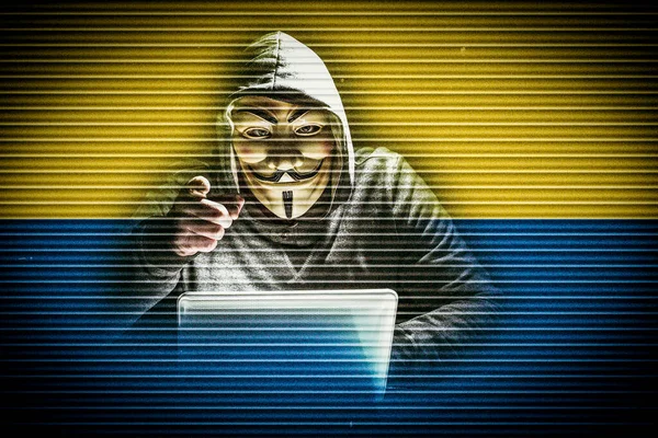 hacker with anonymous mask and hacker with anonymous mask and ukrainian flag vintage television effect