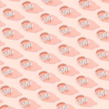 Pembe kablosuz kulaklıklı soyut bir arka plan. 3d hazırlayıcı