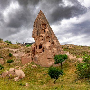 structure carved into the rock near Uchisar. Turkey.