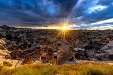 GOREME/TURKEY - June 26, 2022: view of the city of goreme at sunset.