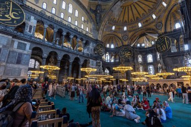 ISTANBUL/TURKEY - July 07, 2022: tourists visit Hagia sophia mosque