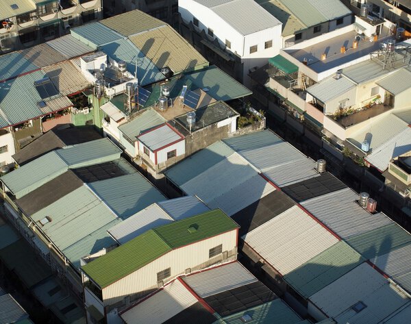 A crowded residential area in a city seen from above