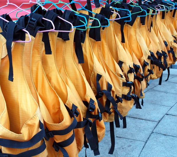 Lifejackets on Hangers — Stock Photo, Image