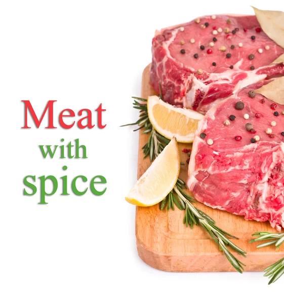 Raw meat with spices, isolated — Stock Photo, Image