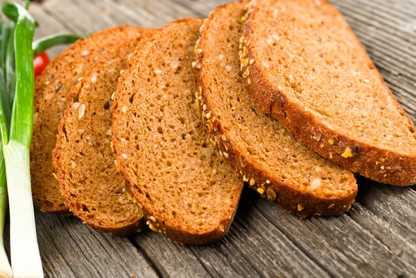 Slices of finest organic bread — Stock Photo, Image