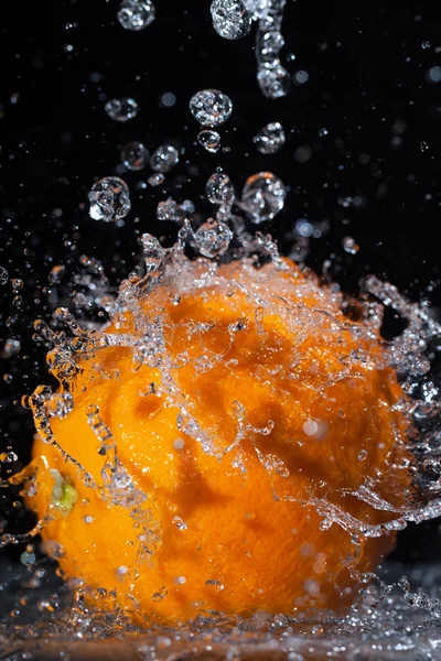 Orange and water. Stock Picture