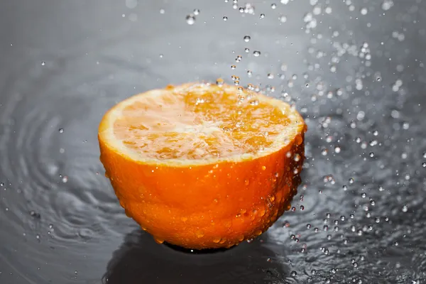 Orange and water. — Stock Photo, Image