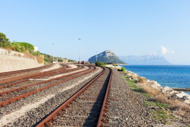 Railway at Mediterranean sea, Sardinia, Italy. clipart