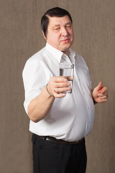 Man and glass. — Stock Photo, Image