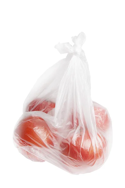 Tomaten in Plastik. — Stockfoto