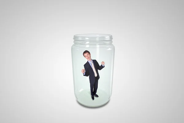 Businessman inside glass jar — Stock Photo, Image