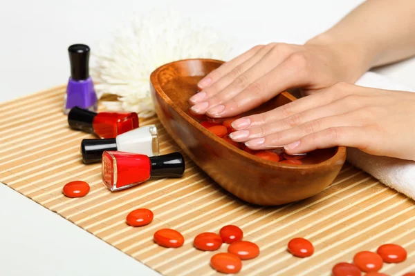 Woman is getting manicure — Stock Photo, Image