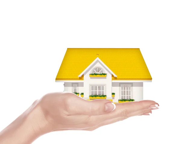 The house with colour roof in human hands — Stock Photo, Image