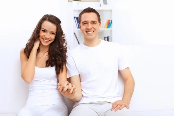 Young happy couple at hone together s — Stock Photo, Image