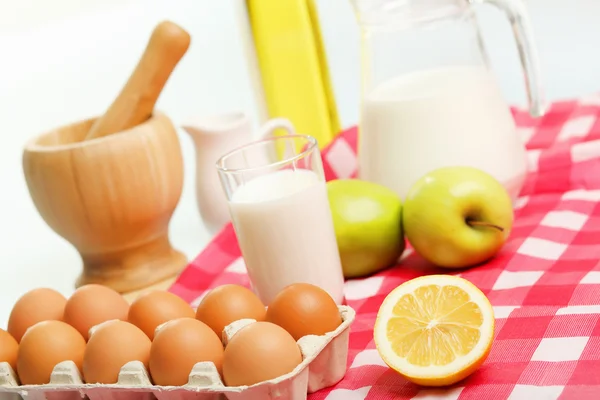 Milk in a glass jar and eggs Royalty Free Stock Images
