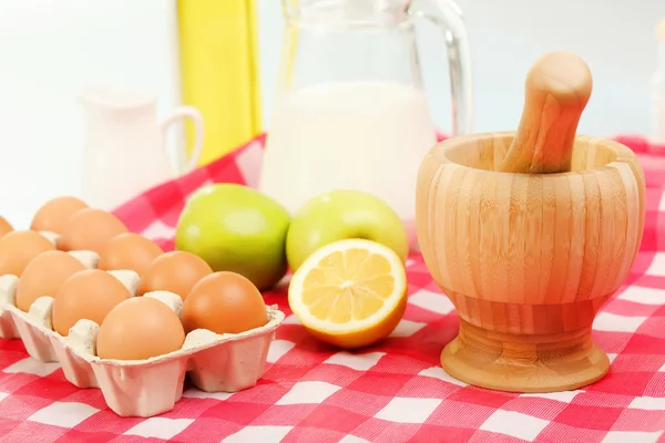 Milk in a glass jar and eggs Royalty Free Stock Photos