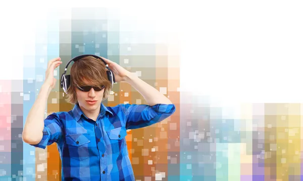 Happy smiling young man dancing — Stock Photo, Image