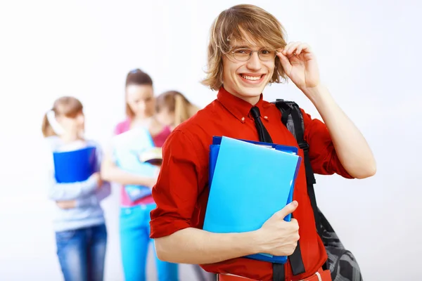 Student v červené košili s knihami — Stock fotografie