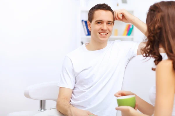 Young happy couple at hone together s — Stock Photo, Image