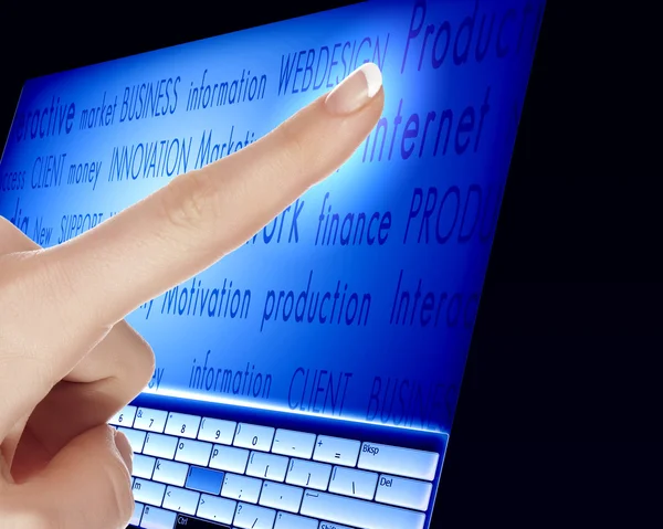 Finger touching a blue computer screen — Stock Photo, Image
