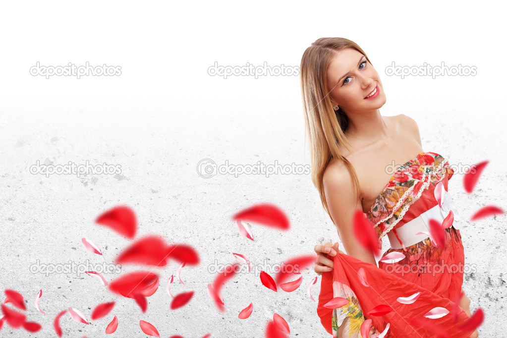 Beautiful young woman in red dress