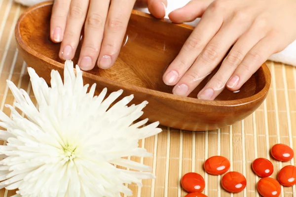 Woman is getting manicure — Stock Photo, Image