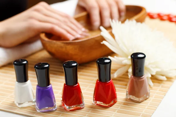 Woman is getting manicure — Stock Photo, Image