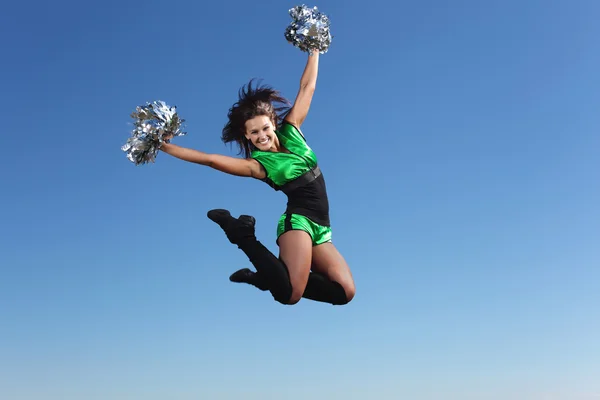 Young female dancer against white background — Stock Photo, Image