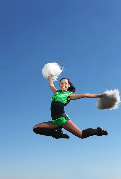 Young female dancer against white background — Stock Photo, Image