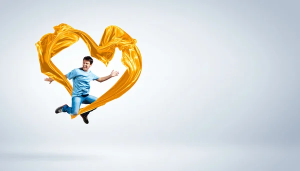 Young man Dancing With Fabric — Stock Photo, Image