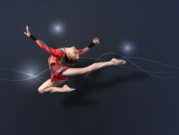 Young woman in gymnast suit posing — Stock Photo, Image