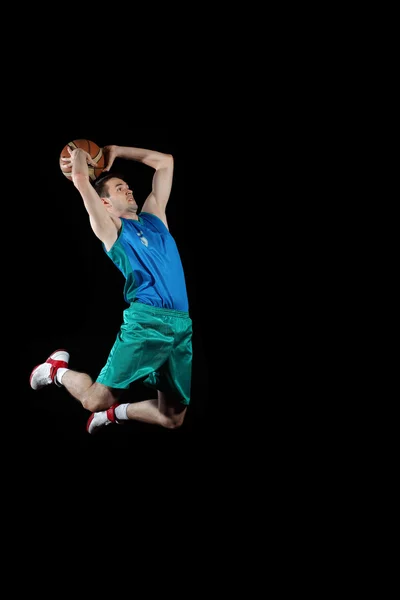 Topu olan bir basketbolcu — Stok fotoğraf