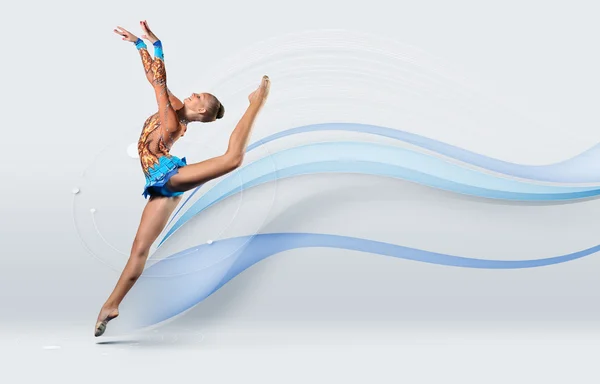 Young woman in gymnast suit posing — Stock Photo, Image