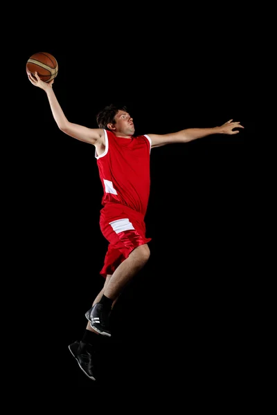 バスケットボール選手、ボール付き — ストック写真