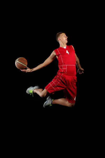 Basketbalspeler met een bal — Stockfoto
