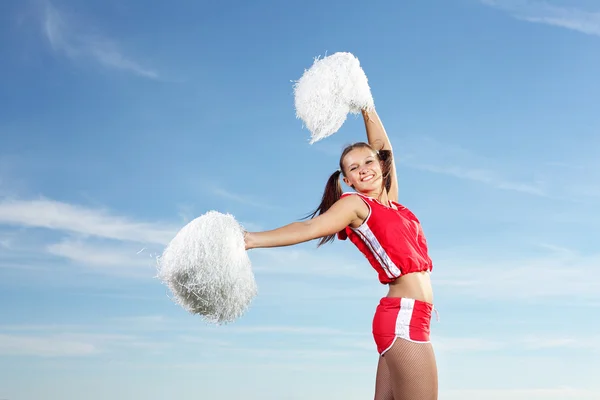 Młoda kobieta cheerleaderka — Zdjęcie stockowe