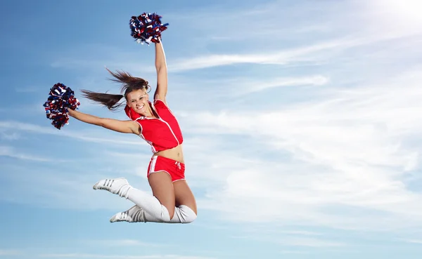 Unga kvinnliga cheerleader — Stockfoto