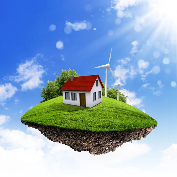 A piece of land in the air with house and tree. — Stock Photo, Image