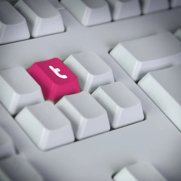 Keyboard with button showing the chat icon — Stock Photo, Image