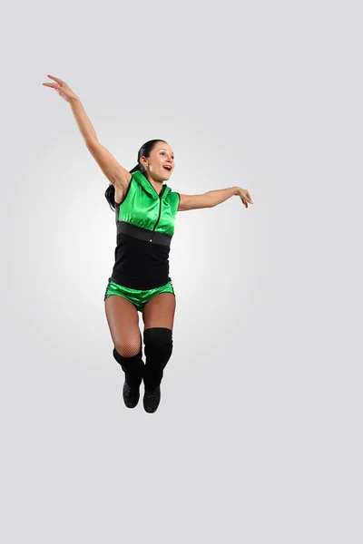 Young female dancer against white background — Stock Photo, Image