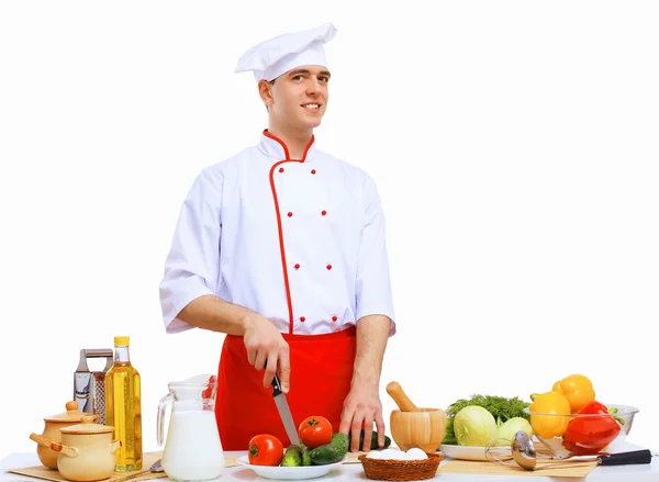 Young cook preparing food Royalty Free Stock Photos
