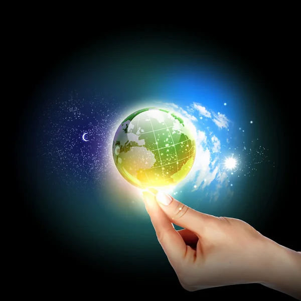 Hand touching the earth — Stock Photo, Image